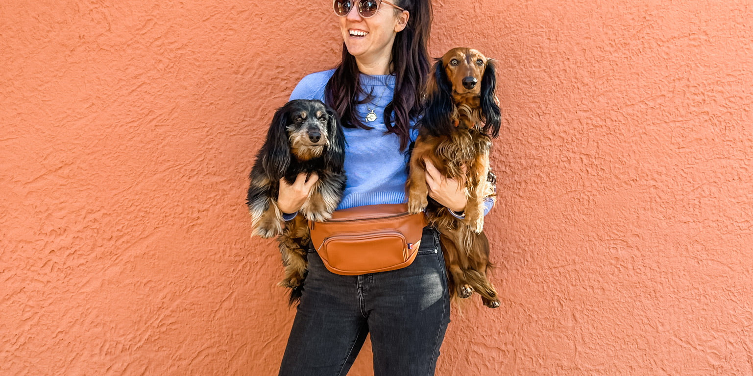 Woman wearing Kibou dog training fanny pack